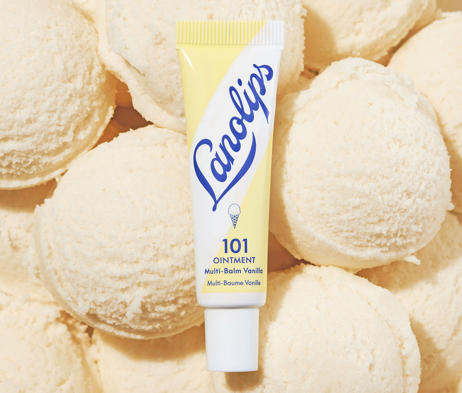 Close up of lanolips 101 ointment multi balm vanilla tube.