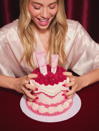 Video of model eating the raspberry shortcake with her hands. The Lanolips 101 Ointment Multi-Balm Raspberry Shortcake and the Raspberry Shortcake Hand & Body Cream are featured in the limited edition Lanolips Raspberry Shortcake Holiday Duo. 
